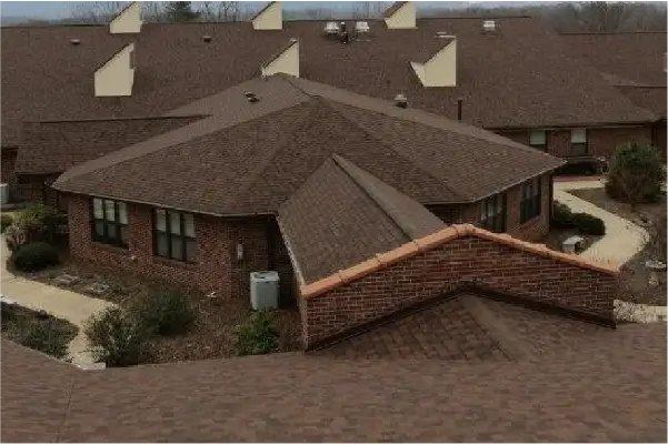 Commercial building with shingle roofing