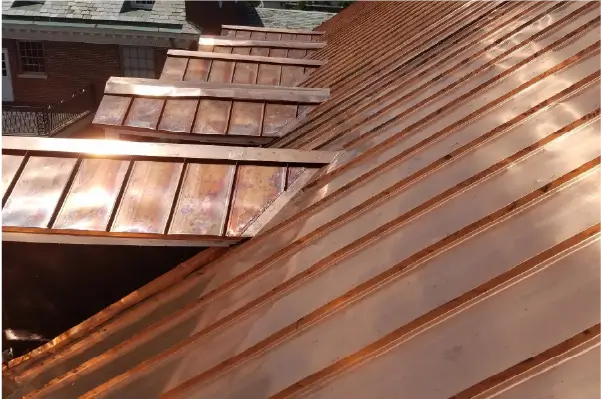 House with standing seam copper roofing