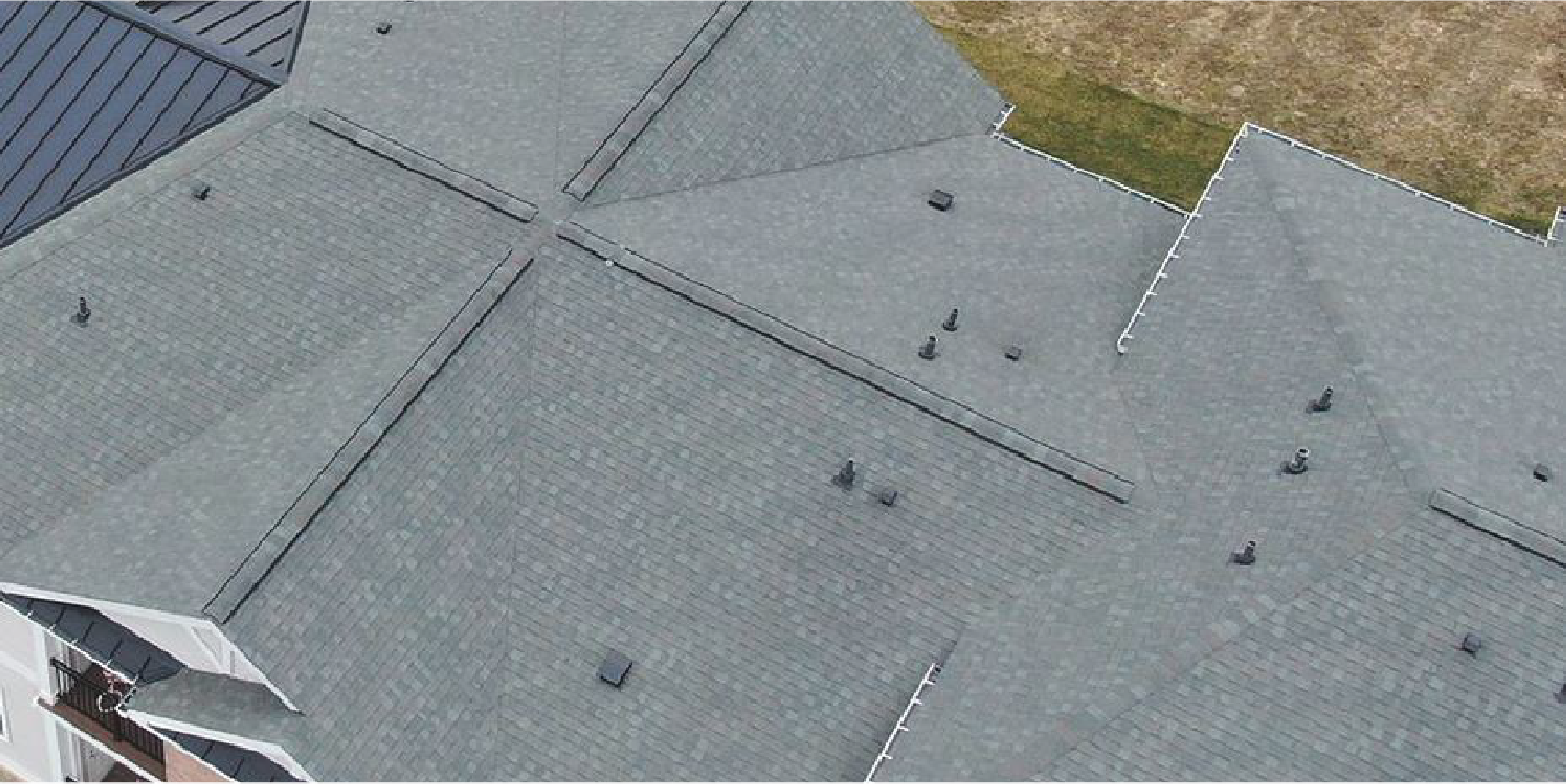Image of a new shingle roof on an apartment complex