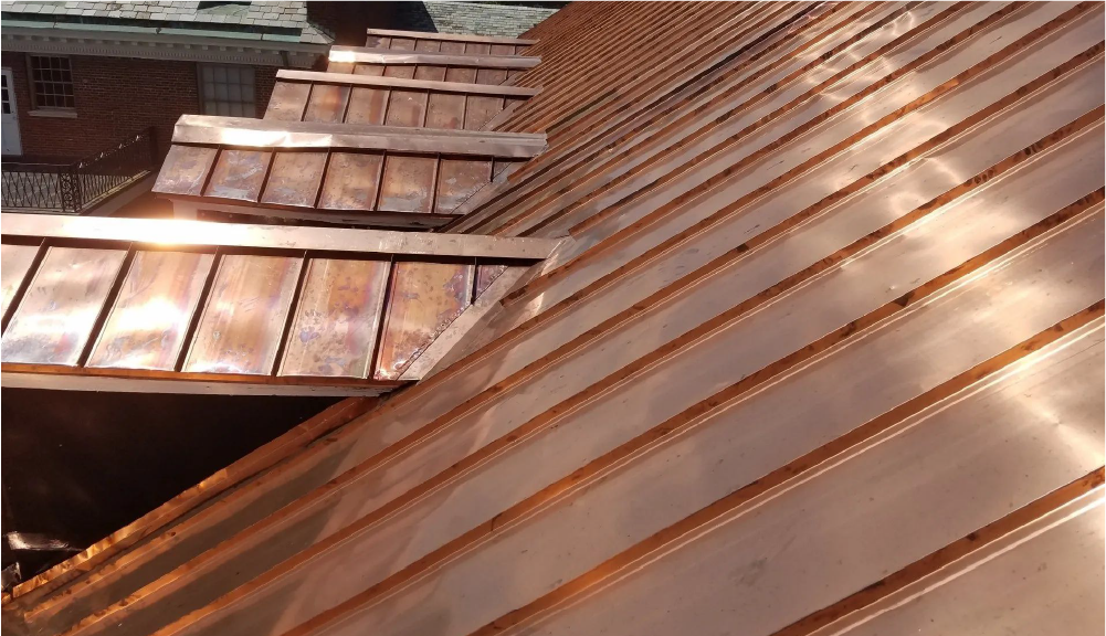 House with standing seam copper roofing