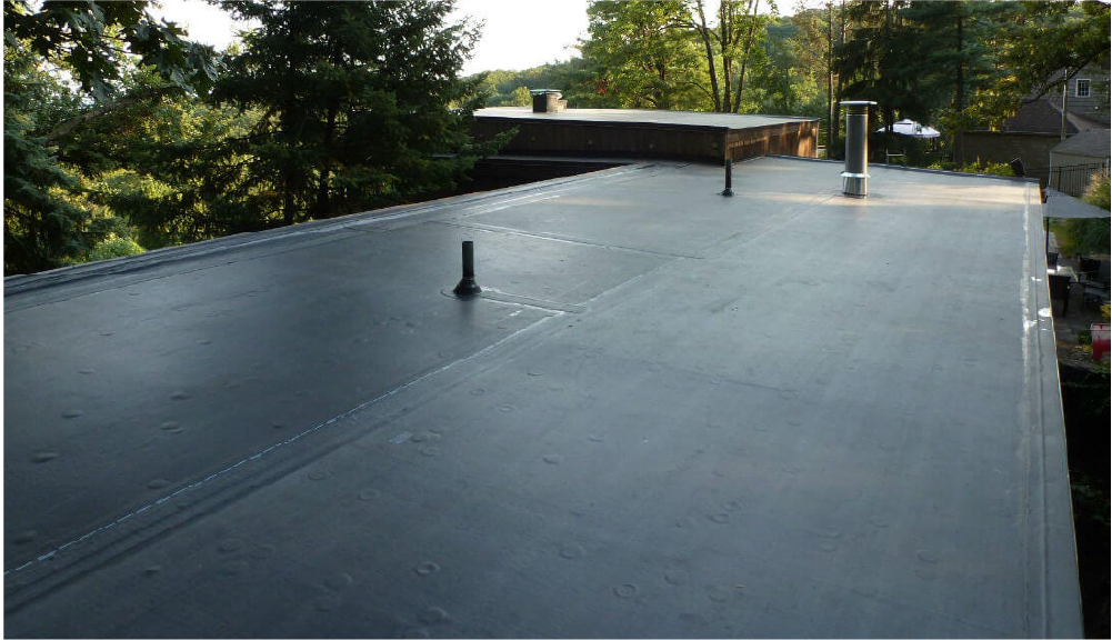 building with epdm roofing installed