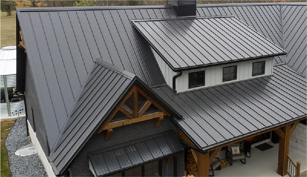 House with standing seam metal roofing