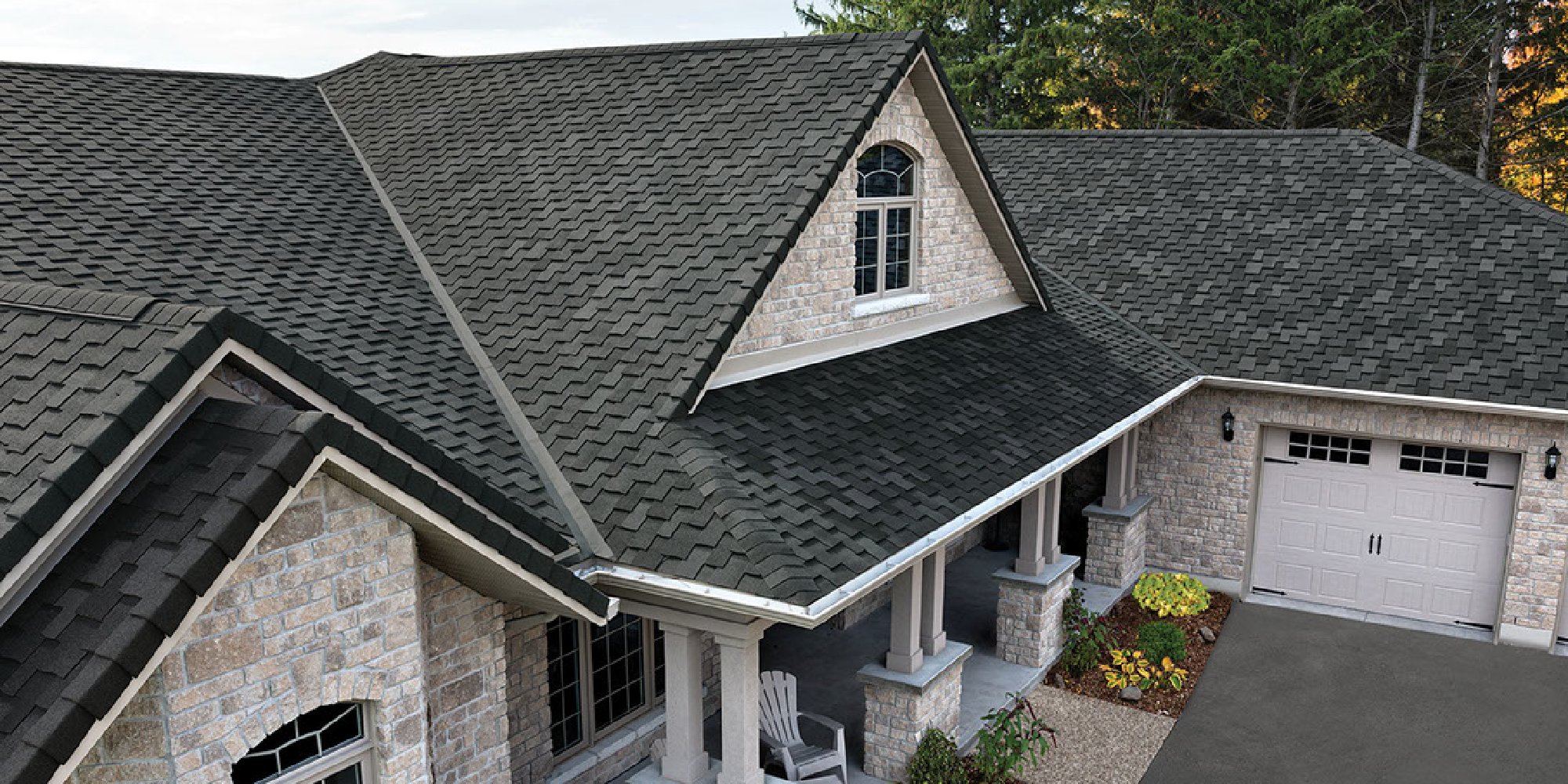Home with asphalt shingle roofing